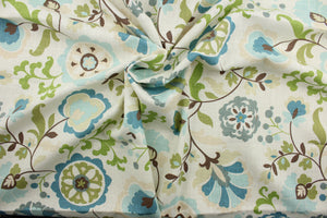 Daphne is a luxurious linen-rayon blend fabric with a floral design featuring shades of blue, brown, cream, and olive green, on an off-white background. This ultra-soft material is perfect for adding texture and visual interest to any décor. The versatile fabric is perfect for window accents (draperies, valances, curtains and swags) cornice boards, accent pillows, bedding, headboards, cushions, ottomans, slipcovers and light duty upholstery. 
