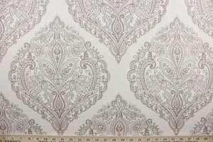 Arabella is a multi use fabric featuring a damask floral design in gray, brown and cream.  The versatile fabric is perfect for window accents (draperies, valances, curtains and swags) cornice boards, accent pillows, bedding, headboards, cushions, ottomans, slipcovers and upholstery.  It has a soft workable feel yet is stable and durable