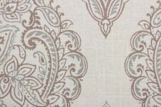  Arabella is a multi use fabric featuring a damask floral design in gray, brown and cream.  The versatile fabric is perfect for window accents (draperies, valances, curtains and swags) cornice boards, accent pillows, bedding, headboards, cushions, ottomans, slipcovers and upholstery.  It has a soft workable feel yet is stable and durable.
