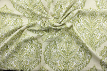 Load image into Gallery viewer, Arabella is a multi use fabric featuring a damask floral design in shades of green and ivory against a cream background.  The versatile fabric is perfect for window accents (draperies, valances, curtains and swags) cornice boards, accent pillows, bedding, headboards, cushions, ottomans, slipcovers and upholstery.  It has a soft workable feel yet is stable and durable.
