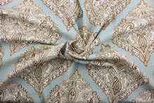 Load image into Gallery viewer, Arabella is a multi use fabric featuring a damask floral design in brown, beige and ivory against a light blue green background.  The versatile fabric is perfect for window accents (draperies, valances, curtains and swags) cornice boards, accent pillows, bedding, headboards, cushions, ottomans, slipcovers and upholstery.  It has a soft workable feel yet is stable and durable.
