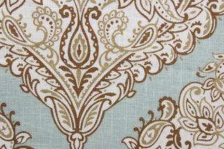 Arabella is a multi use fabric featuring a damask floral design in brown, beige and ivory against a light blue green background.  The versatile fabric is perfect for window accents (draperies, valances, curtains and swags) cornice boards, accent pillows, bedding, headboards, cushions, ottomans, slipcovers and upholstery.  It has a soft workable feel yet is stable and durable.