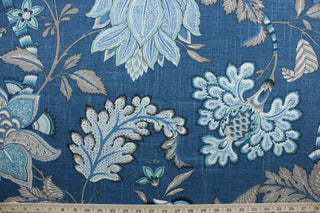 Bowen is a luxurious contemporary floral and vine pattern, showcasing a soothing blend of hues like blue, black, and gray.  Designed for high performance, this fabric sports a soil and stain repellent finish, plus a robust rating of 17,000 double rubs.  The versatile fabric is perfect for window accents (draperies, valances, curtains and swags) cornice boards, accent pillows, bedding, headboards, cushions, ottomans, slipcovers and light duty upholstery.  