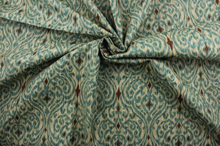 Sri Lanka features a printed cotton damask ikat design in brown, blue, green, and tan.  With its 15,000 double rubs, it is designed to last through everyday wear and tear.  It can be used for several different statement projects including window accents (drapery, curtains and swags), decorative pillows, hand bags, bed skirts, duvet covers, light duty upholstery and craft projects.  