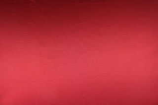 This multi-purpose mock linen in cardinal red has a soft luxurious feel with a subtle sheen.  It would be great for home decor, window treatments, pillows, duvet covers, tote bags and more.  We offer Shauna in other colors.