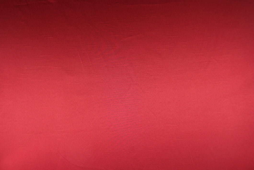 This multi-purpose mock linen in cardinal red has a soft luxurious feel with a subtle sheen.  It would be great for home decor, window treatments, pillows, duvet covers, tote bags and more.  We offer Shauna in other colors.