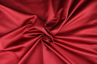 This multi-purpose mock linen in cardinal red has a soft luxurious feel with a subtle sheen.  It would be great for home decor, window treatments, pillows, duvet covers, tote bags and more.  We offer Shauna in other colors.