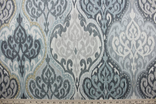 This sophisticated and durable cotton fabric, with its damask print in blue, grey, birch and beige tones, offers a stylish, easy-care fabric for any room.  It can be used for several different statement projects including window accents (drapery, curtains and swags), decorative pillows, hand bags, bed skirts, duvet covers, light duty upholstery and craft projects.  