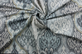 This sophisticated and durable cotton fabric, with its damask print in blue, grey, birch and beige tones, offers a stylish, easy-care fabric for any room.  It can be used for several different statement projects including window accents (drapery, curtains and swags), decorative pillows, hand bags, bed skirts, duvet covers, light duty upholstery and craft projects.  