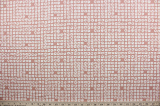 Axel is a multi use fabric featuring a geometrical design in blush and white with a soil and stain repellant finish.  It can be used for several different statement projects including window accents (drapery, curtains and swags), decorative pillows, hand bags, bed skirts, duvet covers, upholstery and craft projects.  It has a soft workable feel yet is stable and has a durability rating of 51,000 double rubs.