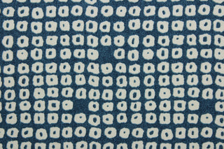  Axel is a multi use fabric featuring a geometrical design in blue grass and off white with a soil and stain repellant finish.  It can be used for several different statement projects including window accents (drapery, curtains and swags), decorative pillows, hand bags, bed skirts, duvet covers, upholstery and craft projects.  It has a soft workable feel yet is stable and has a durability rating of 51,000 double rubs.