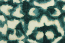 Load image into Gallery viewer, This woven upholstery weight fabric in jade and white is suited for uses that requires a more durable fabric.  The reinforced backing makes it great for upholstery projects including sofas, chairs, dining chairs, pillows, handbags and craft projects.  It is soft and pliable and would make a great accent to any room.
