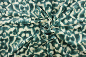 This woven upholstery weight fabric in jade and white is suited for uses that requires a more durable fabric.  The reinforced backing makes it great for upholstery projects including sofas, chairs, dining chairs, pillows, handbags and craft projects.  It is soft and pliable and would make a great accent to any room.