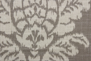Croydon is a premium fabric designed for durability.  It is a blend of cotton and linen that features a slubby basket medallion print.  This fabric is rated to 12,000 double rubs and is a sophisticated shade of beige on a dark taupe background.  It can be used for several different statement projects including window accents (drapery, curtains and swags), decorative pillows, hand bags, bed skirts, duvet covers, upholstery and craft projects.  