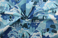Load image into Gallery viewer,  Washburn is a printed Asian inspired fabric that features abstract blooming flowers and trees in shades of blue and white.  The multi use fabric is perfect for window treatments, decorative pillows, custom cushions, bedding, light duty upholstery applications and almost any craft project.  This fabric has a soft workable feel yet is stable and durable with 50,000 double rubs.

