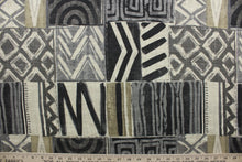 Load image into Gallery viewer, Kenobi is a patchwork fabric featuring a blend of cotton and linen with a tribal printed design. This durable fabric has a 20,000 double rubs rating and comes in shades of grey, stone and beige. The multi use fabric is perfect for window treatments, decorative pillows, custom cushions, bedding, light duty upholstery applications and almost any craft project. 
