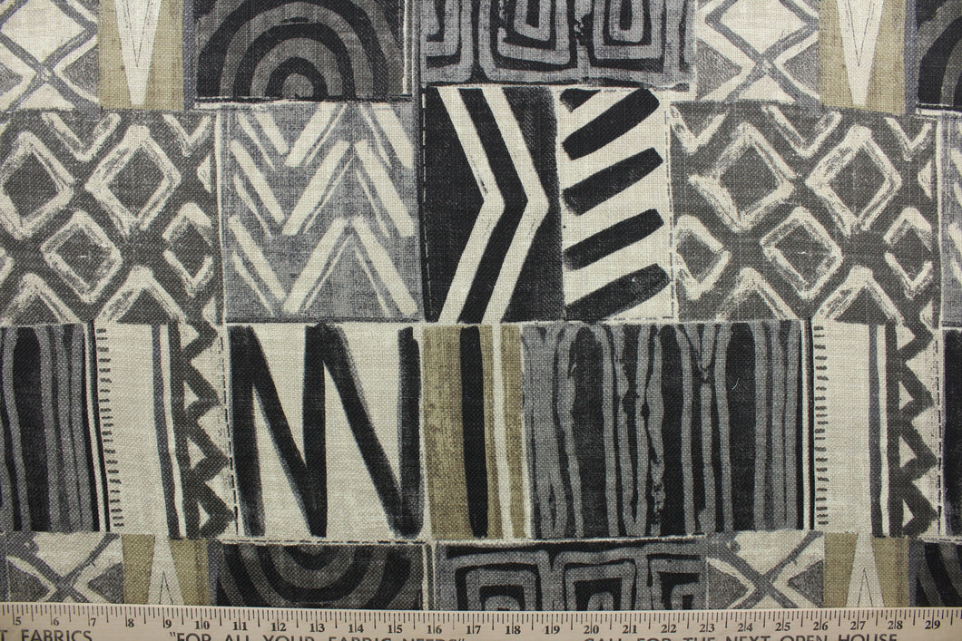 Kenobi is a patchwork fabric featuring a blend of cotton and linen with a tribal printed design. This durable fabric has a 20,000 double rubs rating and comes in shades of grey, stone and beige. The multi use fabric is perfect for window treatments, decorative pillows, custom cushions, bedding, light duty upholstery applications and almost any craft project. 