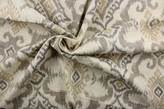 Kantha is a cotton-linen blend with a stain-resistant finish, it features an elegant ikat medallion print in shades of brown and beige. This high-performance fabric offers 50,000 double rubs for added durability.  It can be used for several different statement projects including window accents (drapery, curtains and swags), decorative pillows, hand bags, bed skirts, duvet covers, upholstery and craft projects.  