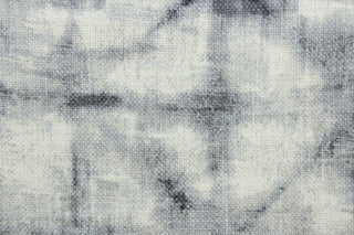 This fabric is a blend of cotton and linen with graphite hues featuring a shibori style print.  It can be used for several different statement projects including window accents (drapery, curtains and swags), decorative pillows, hand bags, bed skirts, duvet covers, upholstery and craft projects.  It has a soft workable feel yet is stable and has a durability rating of 20,000 double rubs.