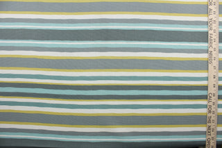 This fabric features a multi width stripe design in grey, spa green, teal, dark yellow and white.  It can be used for several different statement projects including window accents (drapery, curtains and swags), decorative pillows, hand bags, bed skirts, duvet covers, upholstery and craft projects.  