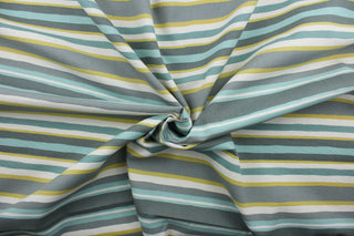 This fabric features a multi width stripe design in grey, spa green, teal, dark yellow and white.  It can be used for several different statement projects including window accents (drapery, curtains and swags), decorative pillows, hand bags, bed skirts, duvet covers, upholstery and craft projects.  