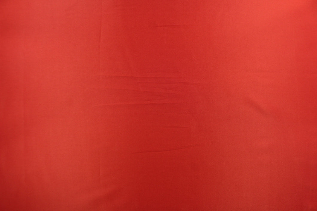 This taffeta fabric in deep orange is lightweight, smooth and crisp and features an iridescent sheen.  Uses include evening gowns, jackets, skirts, blouses, curtains and home interior decorations.