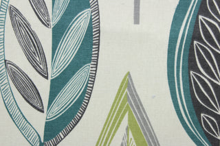 Lassiter is a high-quality upholstery fabric featuring a printed leaf pattern, available in spa blue, fern green, light grey and charcoal, with a crème background.  With 50,000 double rubs, this luxurious and stylish fabric is sure to stand up to many years of wear and tear. It can be used for several different statement projects including window accents (drapery, curtains and swags), decorative pillows, hand bags, bed skirts, duvet covers, upholstery and craft projects.  