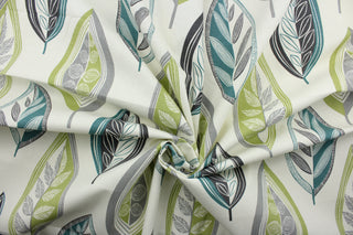 Lassiter is a high-quality upholstery fabric featuring a printed leaf pattern, available in spa blue, fern green, light grey and charcoal, with a crème background.  With 50,000 double rubs, this luxurious and stylish fabric is sure to stand up to many years of wear and tear. It can be used for several different statement projects including window accents (drapery, curtains and swags), decorative pillows, hand bags, bed skirts, duvet covers, upholstery and craft projects.  