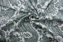 Load image into Gallery viewer,  Brevard is a beautiful blend of cotton and linen, featuring a floral pattern in tones of gray and white.  Its durability is tested to withstand 18,000 double rubs—making it an ideal choice for upholstery and other high-traffic purposes.  The versatile fabric is perfect for window accents (draperies, valances, curtains and swags) cornice boards, accent pillows, bedding, headboards, cushions, ottomans, and slipcovers.
