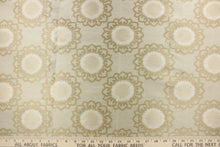 Load image into Gallery viewer, This fabric feature a medallion design in beige and tan .
