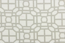 Load image into Gallery viewer,  This fabric features a geometric design in gray and white . 
