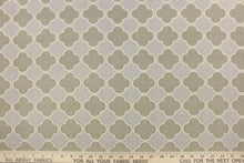 Load image into Gallery viewer, This fabric features a lattice quatrefoil design in taupe, gray and dull white. 
