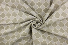Load image into Gallery viewer, This fabric features a lattice quatrefoil design in taupe, gray and dull white. 
