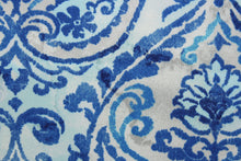 Load image into Gallery viewer, Summer Medley features a vibrant medallion design in shades of blue, light grey and white. This durable fabric is stain, mildew and UV resistant with 51,000 double rubs, making it perfect for any outdoor space. Uses include cushions, tablecloths, upholstery projects, decorative pillows and craft projects. 
