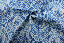 Load image into Gallery viewer, Summer Medley features a vibrant medallion design in shades of blue, light grey and white. This durable fabric is stain, mildew and UV resistant with 51,000 double rubs, making it perfect for any outdoor space. Uses include cushions, tablecloths, upholstery projects, decorative pillows and craft projects. 
