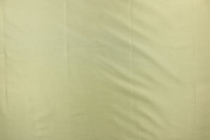  This taffeta fabric in a solid olive green.