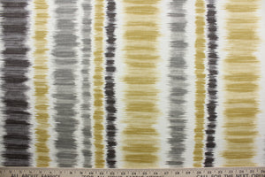 Merson is a multi-purpose fabric featuring a striped ikat design in gray, black, gold, and off white.  The versatile fabric is perfect for window accents (draperies, valances, curtains and swags) cornice boards, accent pillows, bedding, headboards, cushions, ottomans, slipcovers and upholstery.  