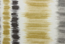 Load image into Gallery viewer, Merson is a multi-purpose fabric featuring a striped ikat design in gray, black, gold, and off white.  The versatile fabric is perfect for window accents (draperies, valances, curtains and swags) cornice boards, accent pillows, bedding, headboards, cushions, ottomans, slipcovers and upholstery.  

