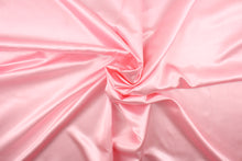 Load image into Gallery viewer, A beautiful satin fabric in a light pink color.
