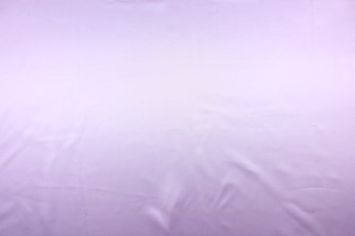  A beautiful satin fabric in a light purple color. 