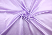 Load image into Gallery viewer,  A beautiful satin fabric in a light purple color. 
