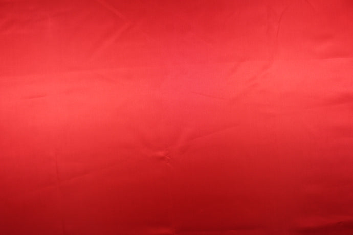 A beautiful satin fabric in a red color