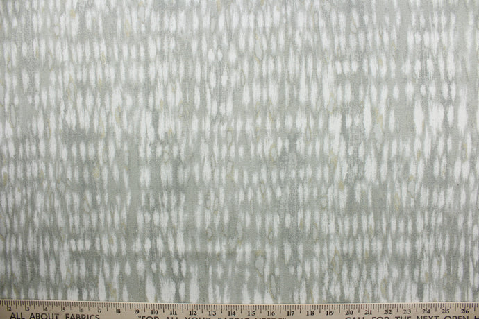  Taavi is a versatile fabric featuring a contemporary abstract design in gray and off white.  It has a soil and stain repellent finish that will keep this fabric looking like new even after 15,000 double rubs.  Uses include window treatments, pillow shams, duvet covers, toss pillows, slip covers, and upholstery to create a complete interior design look.