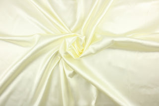 A beautiful satin fabric in a  off white color