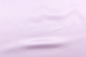 A beautiful satin fabric in a pale purple color.