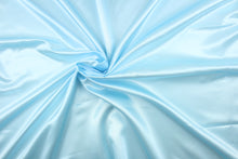 Load image into Gallery viewer, A beautiful satin fabric in a pale blue color.
