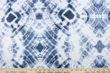 Load image into Gallery viewer, This 2-pass drapery lining features a tie dye design in denim blue and white.  It is used to keep rooms cooler in the summer and warmer in the winter.  The fabric lining adds fullness to your window treatments.  It is light weight and easy to sew and simple to maintain.
