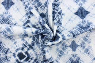 This 2-pass drapery lining features a tie dye design in denim blue and white.  It is used to keep rooms cooler in the summer and warmer in the winter.  The fabric lining adds fullness to your window treatments.  It is light weight and easy to sew and simple to maintain.