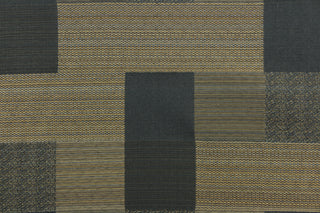 This fabric features a block design graphite, dark beige with hints of blue.  It offers beautiful design, style and color to any space in your home.  It has a soft workable feel and is perfect for window treatments (draperies, valances, curtains, and swags), bed skirts, duvet covers, light upholstery, pillow shams and accent pillows.  