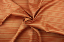 Load image into Gallery viewer, This 2-pass drapery lining features stripes in orange.  It is used to keep rooms cooler in the summer and warmer in the winter.  The fabric lining adds fullness to your window treatments.  It is light weight and easy to sew and simple to maintain.
